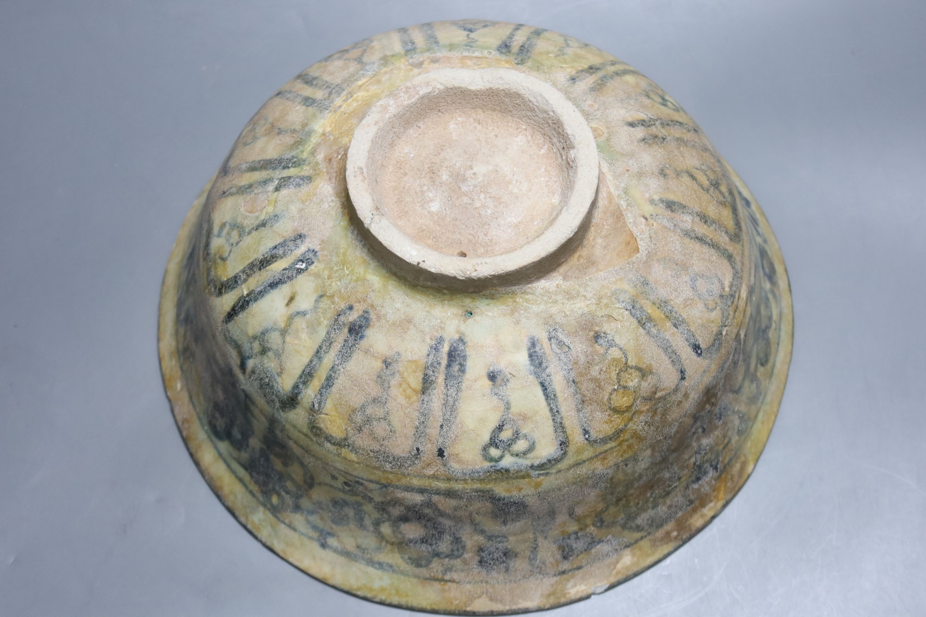 A Middle eastern bowl, Islamic with script to exterior, diameter 29cm